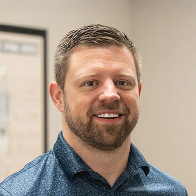 A headshot photo of Dr. Tyler Tonderum