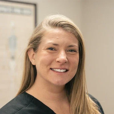 A headshot photo of Kelly Nichols